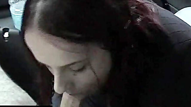 A busty girl in a car sucking her friends small dick