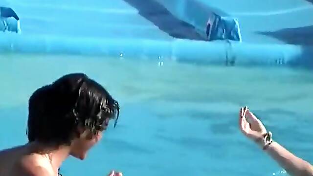 Accidental nipple slip at a water slide