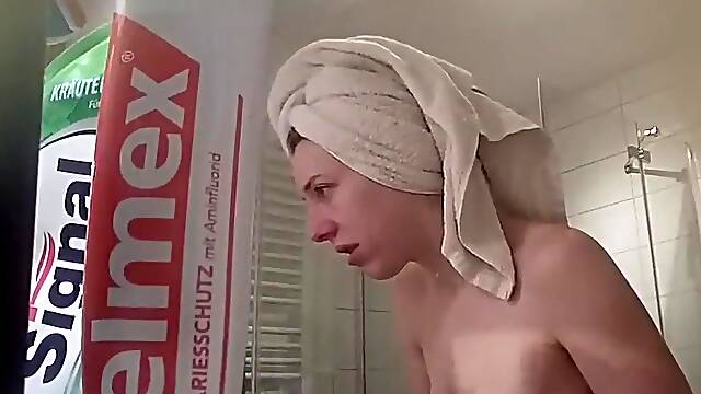 Cute German caught in the shower 1