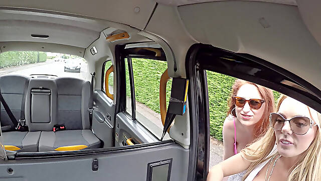 Stacy Seran and Princess Paris take turns on a cab driver