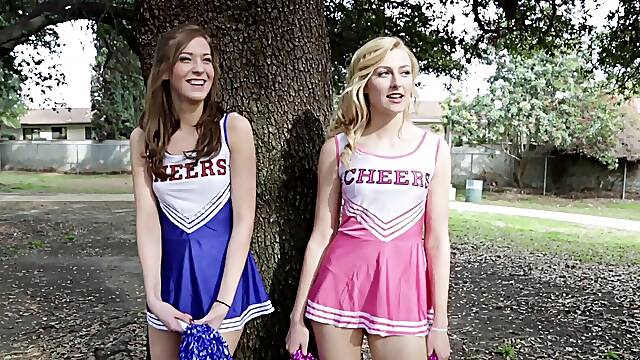 Two young cheerleaders, alexa and molly, give an unforgettable blowjob on the bed.