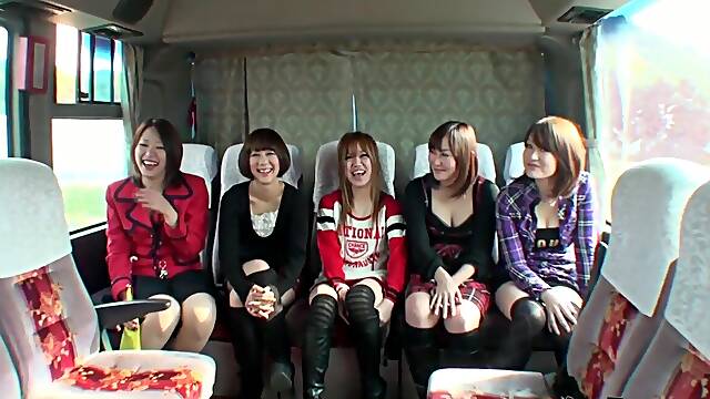 Japanese Group Gathering On The Bus