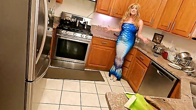 Busty blonde woman is fucked deep in the kitchen