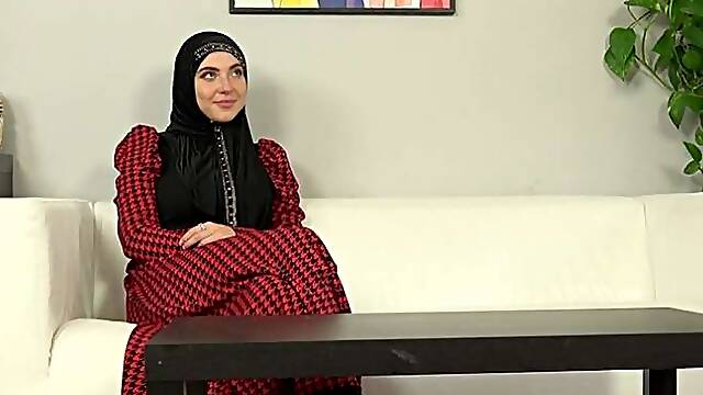 Hot woman in a hijab chose some pictures and some sex