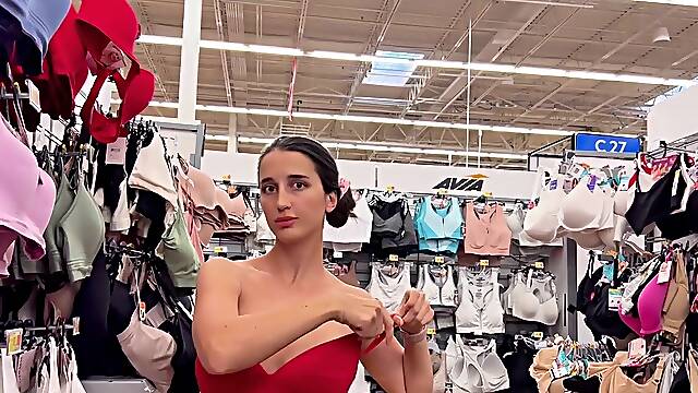 Public tease shows off tits and ass in the store