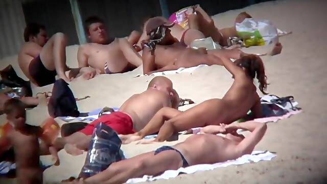 Only on a nudist beach can a voyeur find some good chicks