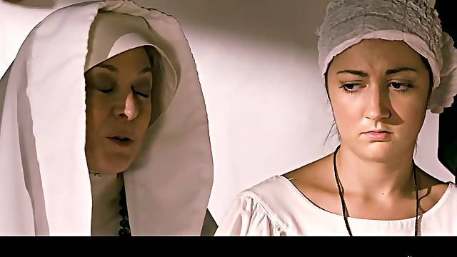 Sexy nuns are playing with each other in front of the camera