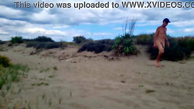 Bare pathetic white serf, fag in jock cage, striptease and proudly present collar, leash, sextoy play at the homo beach, CMNM