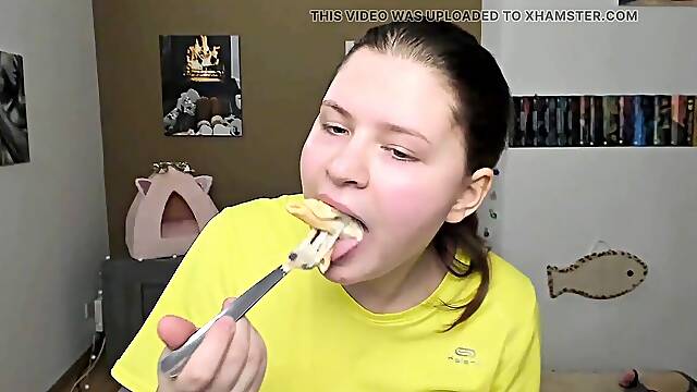 Large fetsh - slurping pasta and guzzling soda