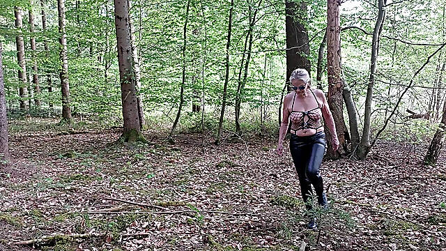 Granny Is Masturbating in the Woods!