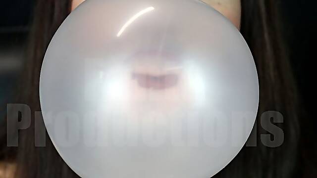 Laney Blowing Bubbles in Striped Dress Front View