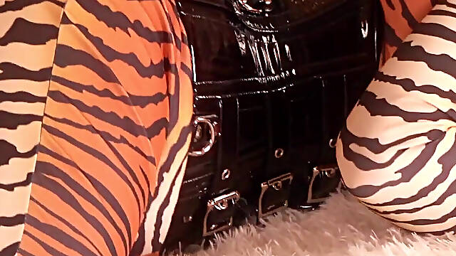 Submissive MILF gagged and bondage taped in spandex catsuit